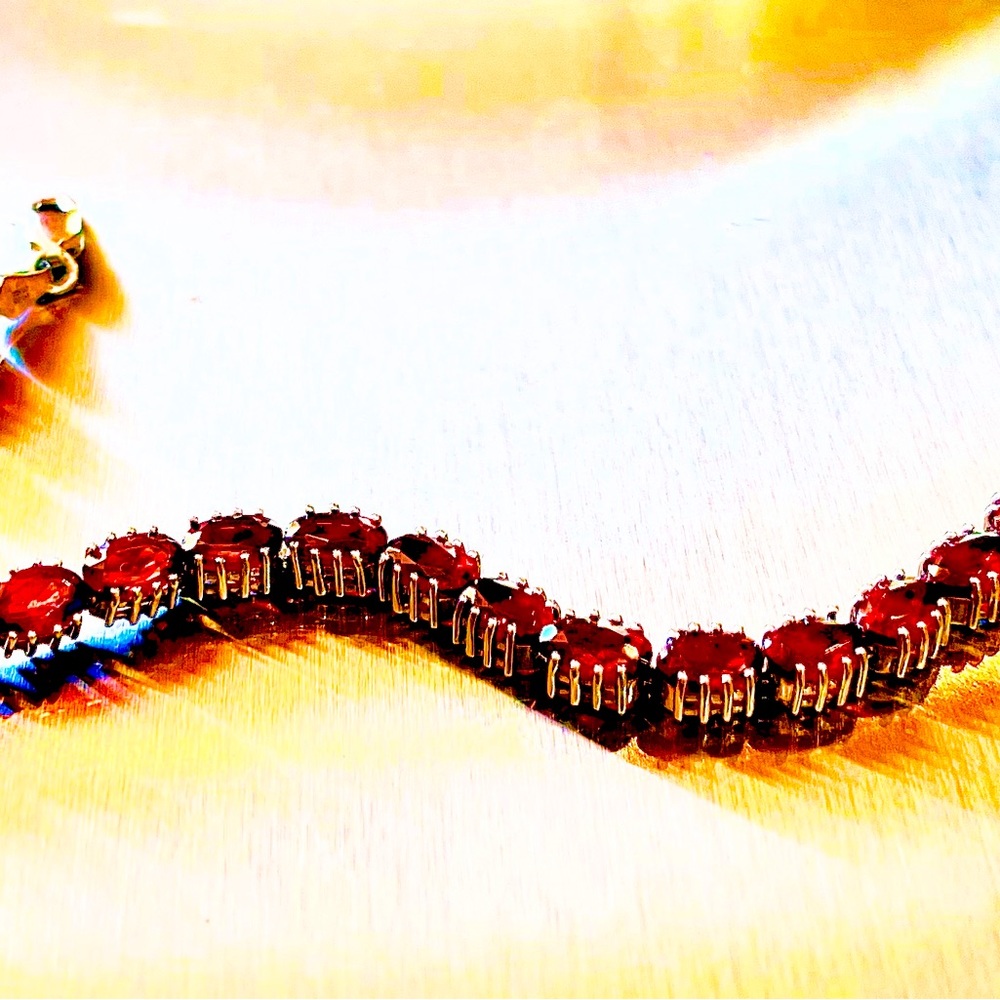 Garnet & 18k gold tennis bracelet 7”